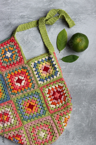 Wallpaper Mural Colorful shopper bag made of organic cotton. Crochet texture close up photo. Environment friendly bag. Granny square pattern.  Torontodigital.ca