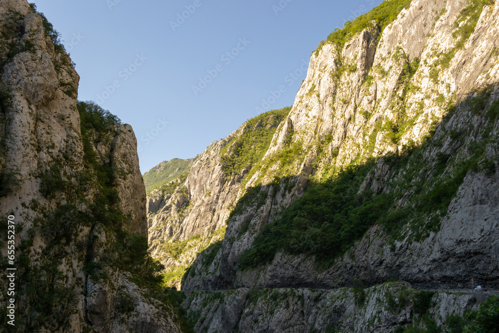 Mountains canyon in Montenegro in the afternoon, shaded by another mountain