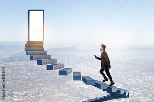 Attractive young caucasian businessman climbing sky stairs to success and opprtunity with open door and mock up place. photo