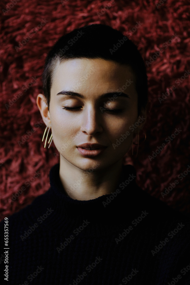 Young woman with eyes closed Young woman with eyes closed