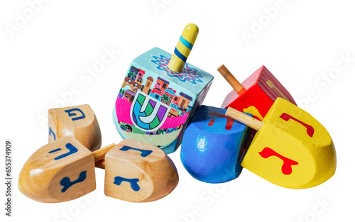 Wooden dreidels for Hanukkah isolated on white or transparent background. photo