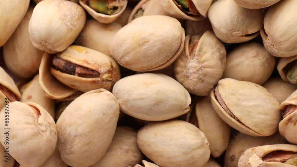 pistachio, rotation in circle. pistachio nuts with a salt, Turning. selective focus
pistachio, rotation in circle. pistachio nuts with a salt, Turning. selective focus