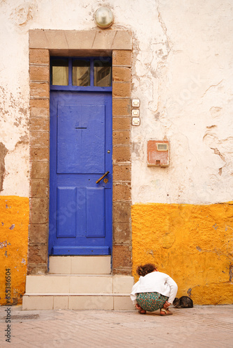 old blue door with kid
