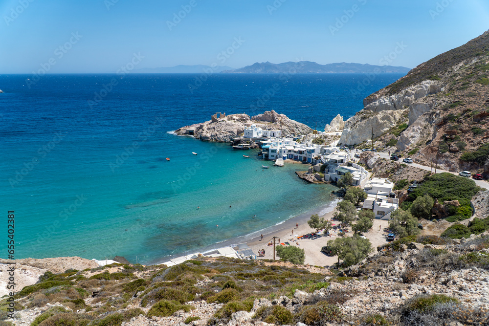 View of Paralia Firopotamos beach next to the Church of Agios Nikolaos church in Milos View of Paralia Firopotamos beach next to the Church of Agios Nikolaos church in Milos