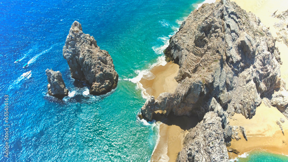 Aerial top view of a beach with rocks