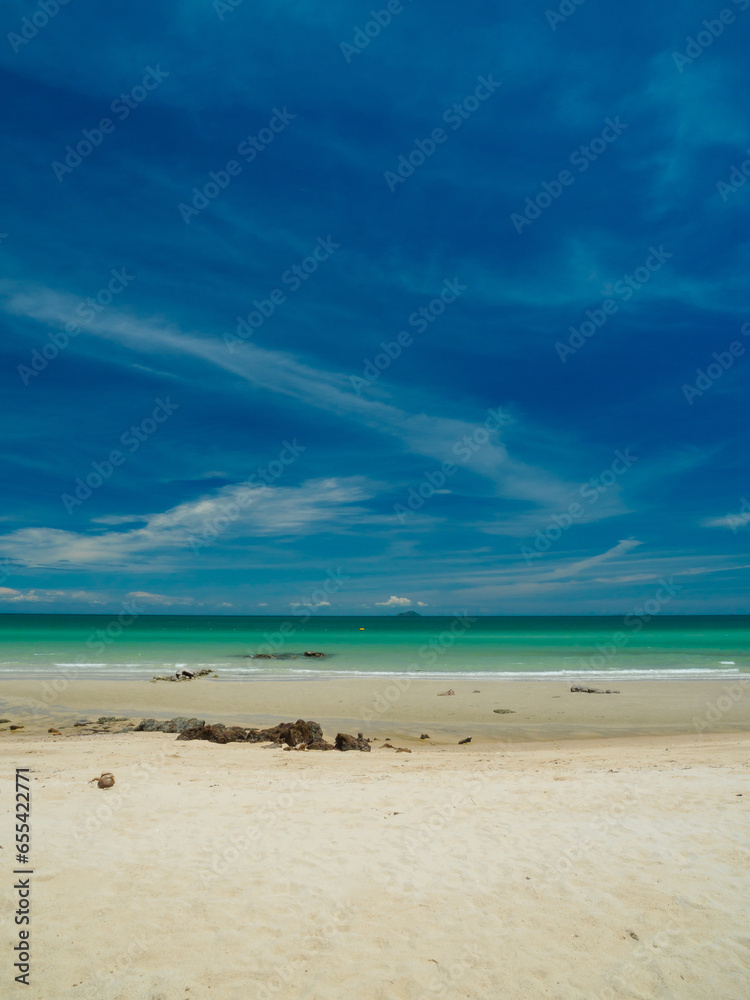 Landscape beautiful summer vertical front view tropical rock sea beach white sand clean and blue sky background calm Nature ocean wave water nobody travel at Sai Kaew Beach thailand Chonburi  day time