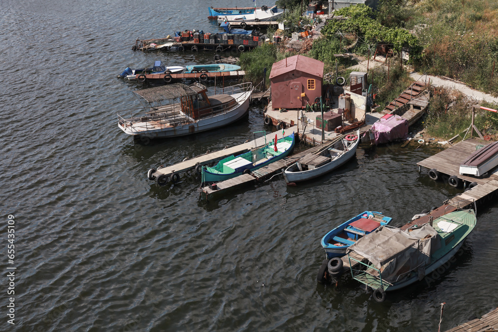 Wooden fishing boats are moored in Varna