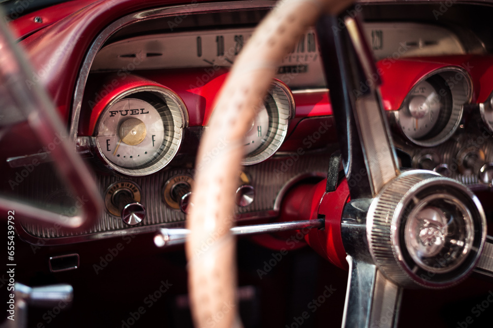 Low fuel gauge; classic car interior Low fuel gauge; classic car interior