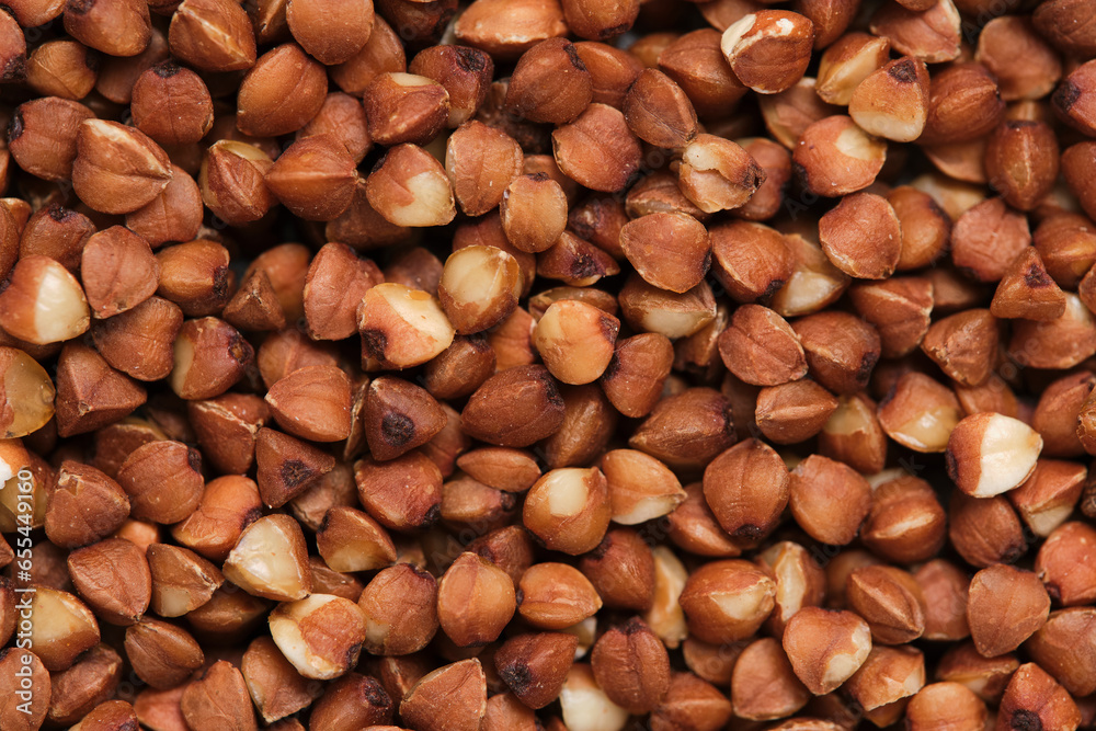 Buckwheat groats closeup on macro photos. Buckwheat groats closeup on macro photos.