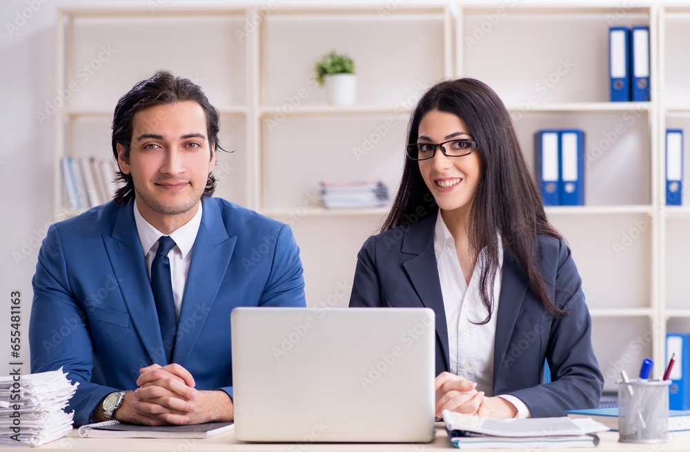 Fototapeta premium Two employees working in the office