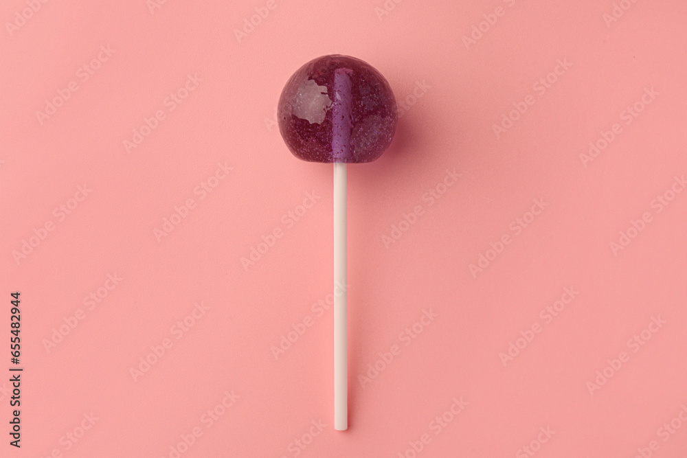Tasty lollipop on pink background, top view Tasty lollipop on pink background, top view