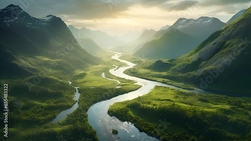 An areal view of a lush landscape with a river snaking through a valley. 