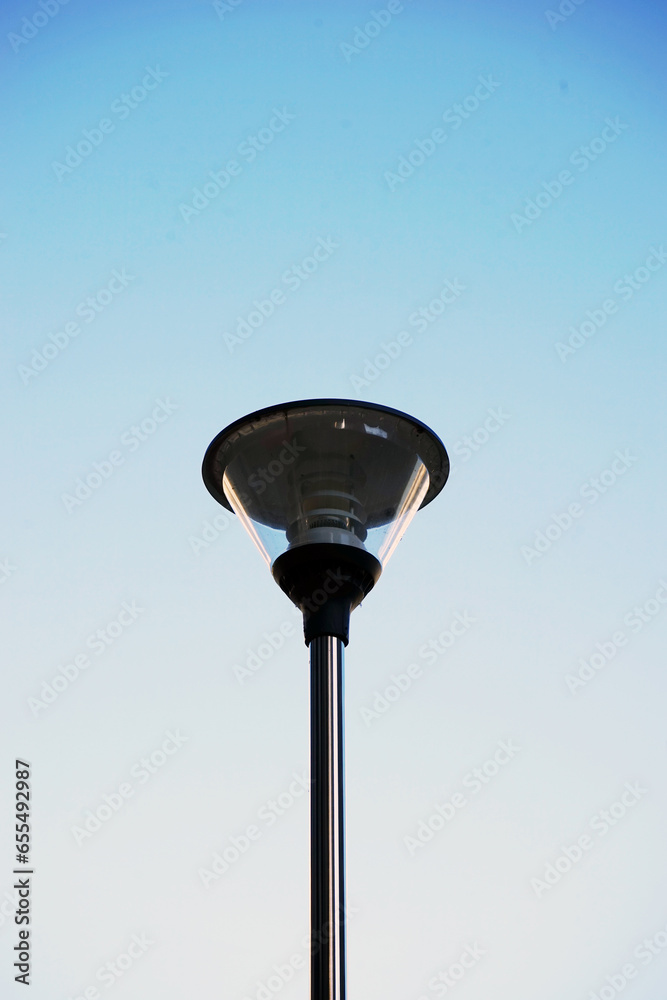 a streetlight that lights up the apartment a streetlight that lights up the apartment