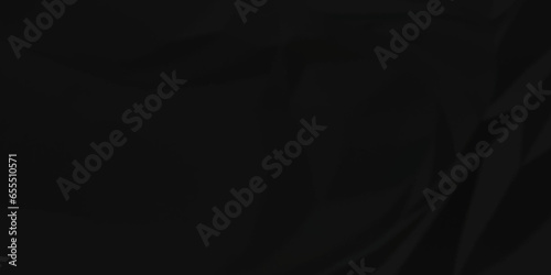 Dark crumple black paper wrinkled poster template ,blank glued creased paper texture background. black paper crumpled backdrop background. used for cardboard and clarkboard.