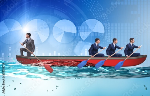 фотографія Disagreement concept with businessmen rowing in different direct