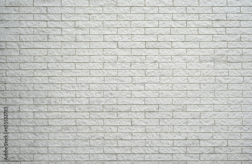 facade view of old white brick wall background