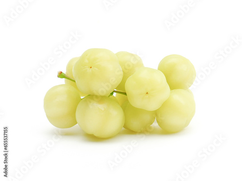 fresh organic sour gooseberry laying on white background small gooseberry Contains antioxidants to help slow down aging Help in matters of the excretory system. and is high in vitamin C.	