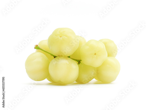 fresh organic sour gooseberry laying on white background small gooseberry Contains antioxidants to help slow down aging Help in matters of the excretory system. and is high in vitamin C.	
