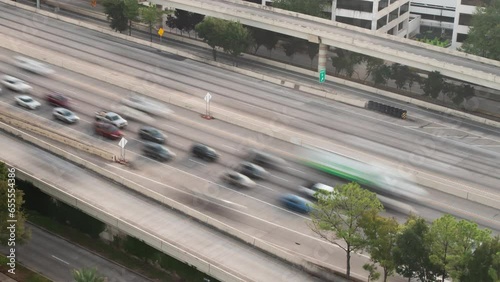 Traffic time lapse of fast moving traffic on the Katy Freeway in Houston, Texas. highway rush hour photo