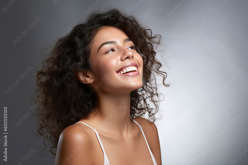 Portrait smiling beautiful young woman with clean perfect skin. Woman with naked shoulders, shiny glowing perfect skin, natural make-up. Beauty treatment, spa, body and skin care. Portrait smiling beautiful young woman with clean perfect skin. Woman with naked shoulders, shiny glowing perfect skin, natural make-up. Beauty treatment, spa, body and skin care.