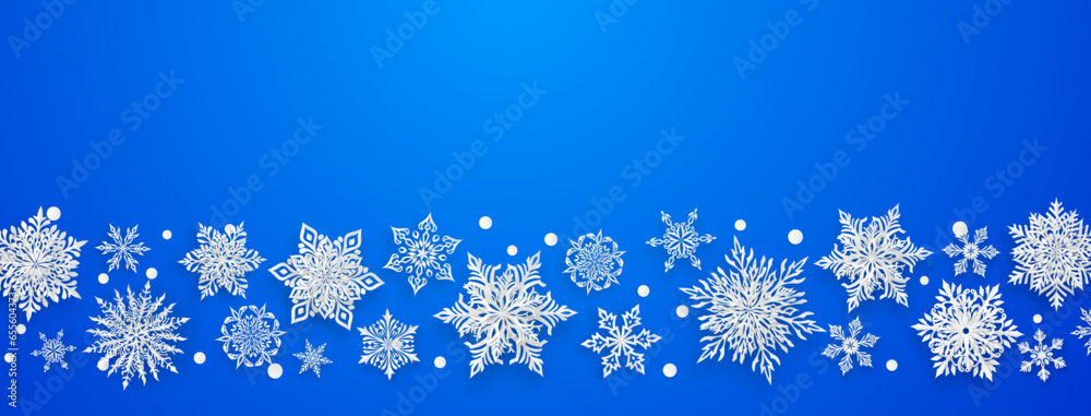 Christmas illustration with beautiful complex paper snowflakes, white on blue background Christmas illustration with beautiful complex paper snowflakes, white on blue background