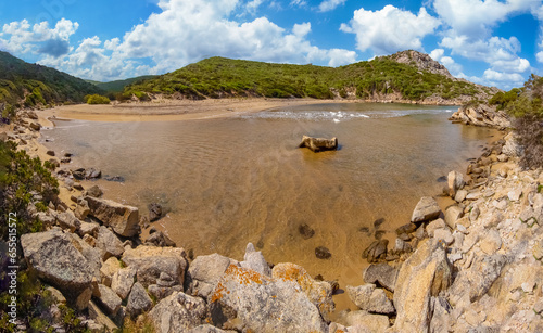 Corse (France) - Corsica is a big touristic french island in Mediterranean Sea, with beautiful beachs and mountains. Here a view of the Sentier du littoral from Campomoro photo