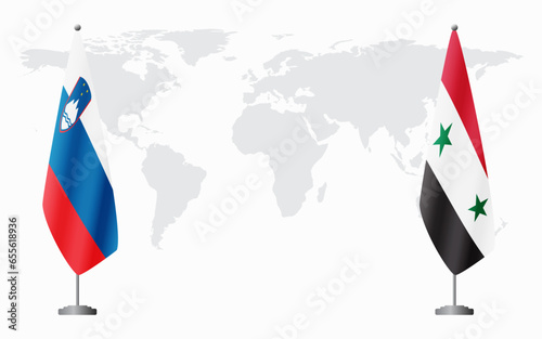 Slovenia and Syria flags for official meeting