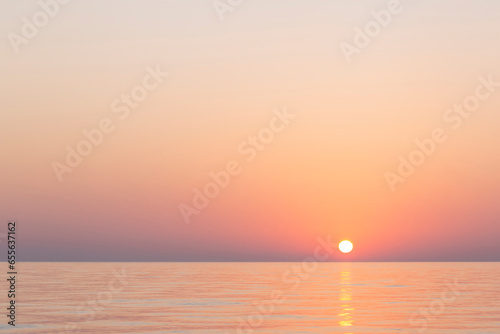 sun rising above Mediterranean sea at summer