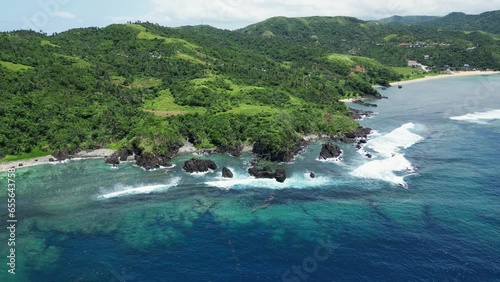 Turquoise Seascape And Green Hills In Baras, Catanduanes, Philippines - aerial drone shot