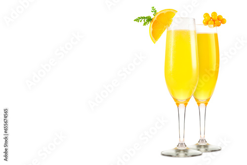 Fototapeta Set of Mimosa cocktails with bubbly champagne and orange juice on white backgrou