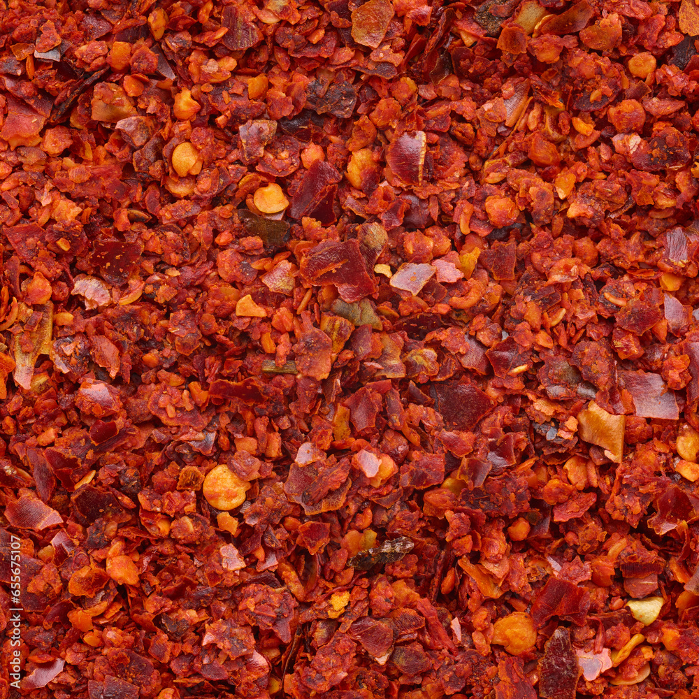 Crushed red pepper heap texture background Crushed red pepper heap texture background