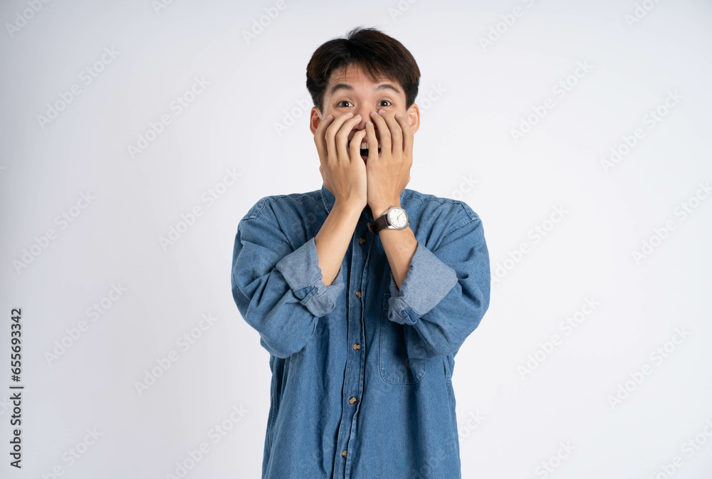 Portrait of Asian male posing on white background Portrait of Asian male posing on white background