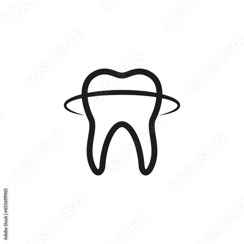 Dental floss around a human tooth. 