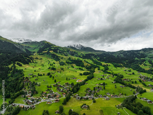 Aerial view of Grindelwald, a village on Bernese Alps in the Jungfrau region, Swiss Alps, Canton of Bern, Switzerland. photo