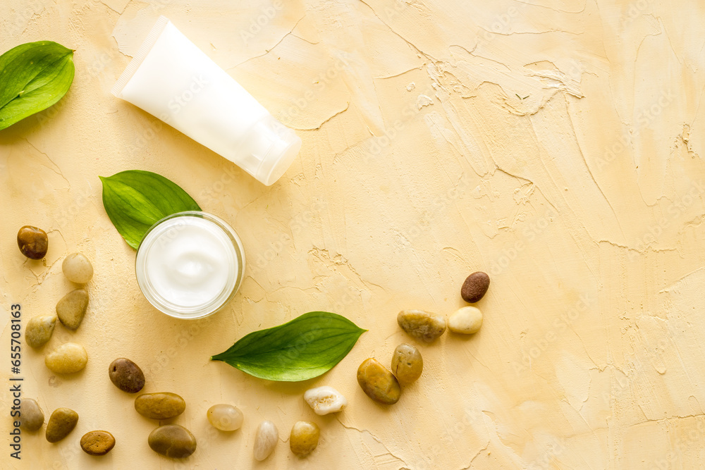 White cosmetic cream for skincare in glass vial, top view White cosmetic cream for skincare in glass vial, top view