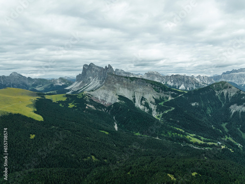 Aerial view of Seceda, a popular mountain peak on the Dolomites in the Odle/Geisler Group situated within Puez-Odle Nature Park in South Tyrol in Northern Italy. photo