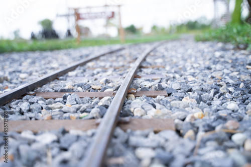 Close-up of small railroad tracks on gravel rocks