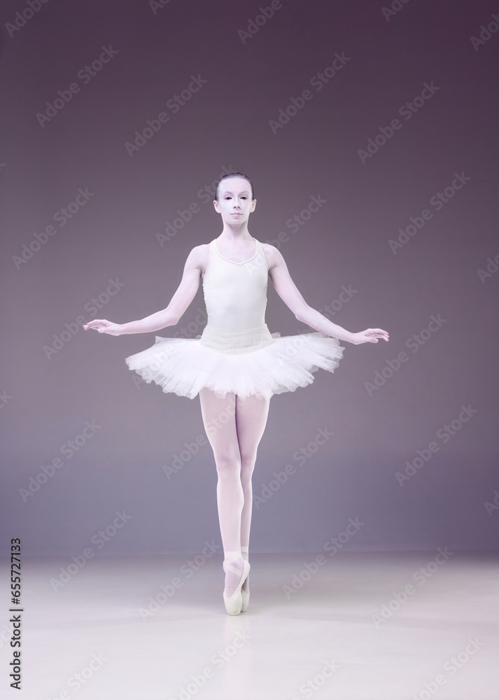 Fototapeta premium Beautiful talented young woman, professional ballerina, in image of porcelain statue dancing over studio background. Concept of classical art, beauty, elegance, classical dance, talent and hobby. Ad