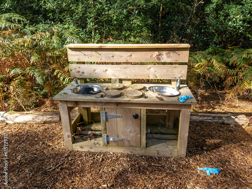 Children outdoor mud kitchen in a forest in County Donegal - Ireland