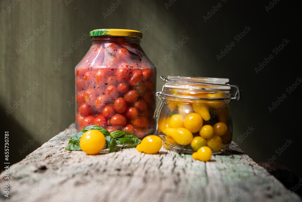 red and yellow cherry tomatoes in a jar for winter red and yellow cherry tomatoes in a jar for winter