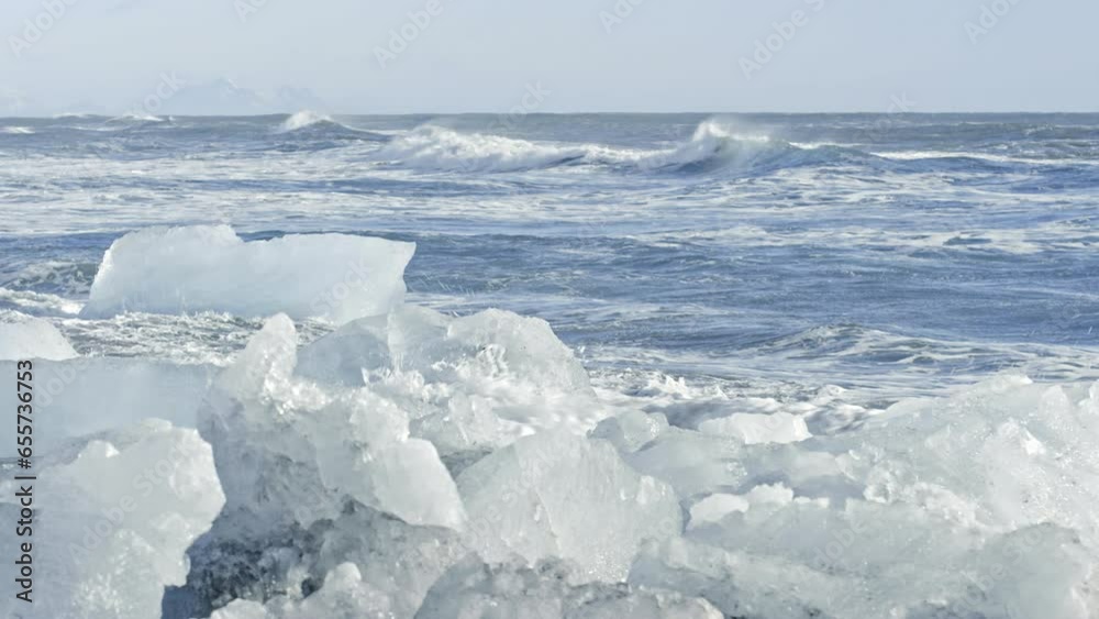 Crashing Ocean Waves On Icy Shore - Low, Still Shot Crashing Ocean Waves On Icy Shore - Low, Still Shot