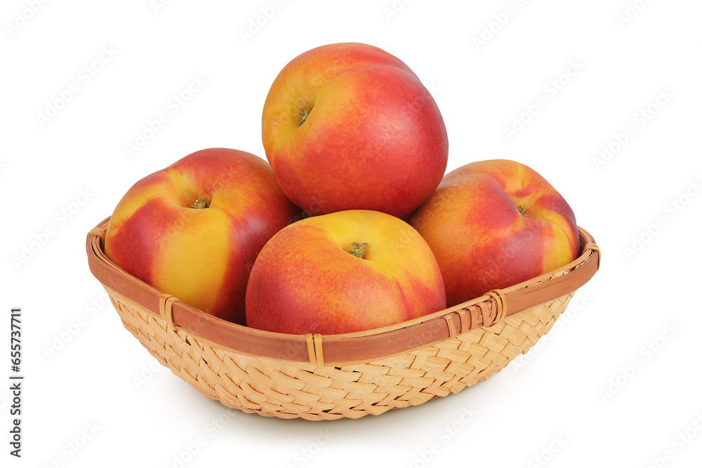 Ripe nectarine fruit in a wicker basket isolated on white background with full depth of field Ripe nectarine fruit in a wicker basket isolated on white background with full depth of field