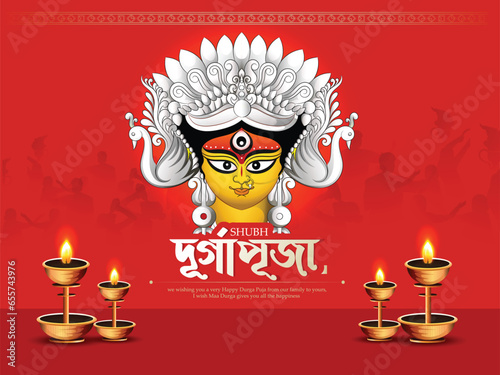 creative vector illustration of Navratri,Durga puja with decorative face of Durga and bengali hand lettring of durga puja.