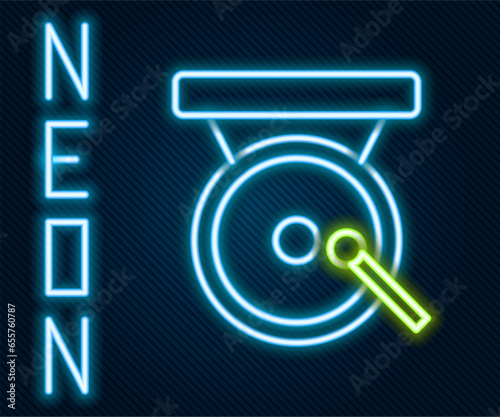 Glowing neon line Boxing gong icon isolated on black background. Boxing bell. Colorful outline concept. Vector