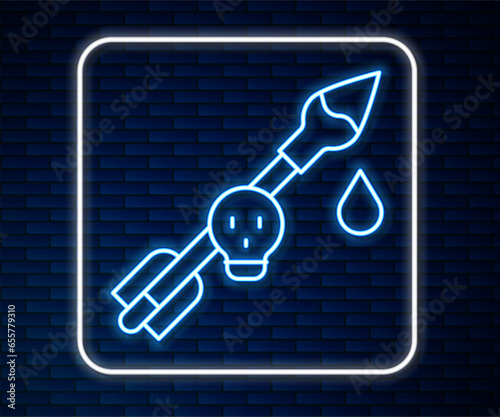 Glowing neon line Poison on the arrow icon isolated on brick wall background. Poisoned arrow. Vector