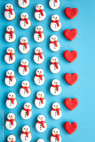 Christmas gingerbread on a blue background, flat lay.