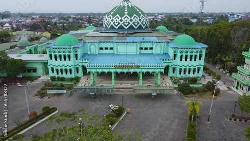 The Riyadhusshalihin grand mosque is located in the city of Barabai which is known as the city of Apam in Hulu sungai tengah district photo