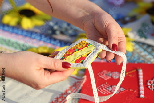 Hands holding a handmade product. photo