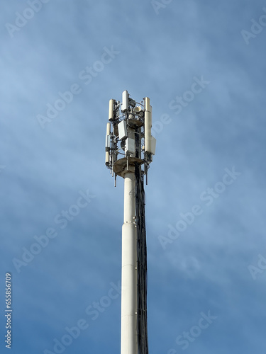 Tall telecommunications tower with antennas