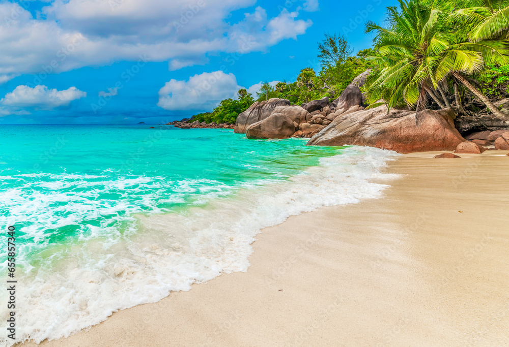 Turquoise water, granite rocks and palm trees in Anse Lazio Turquoise water, granite rocks and palm trees in Anse Lazio